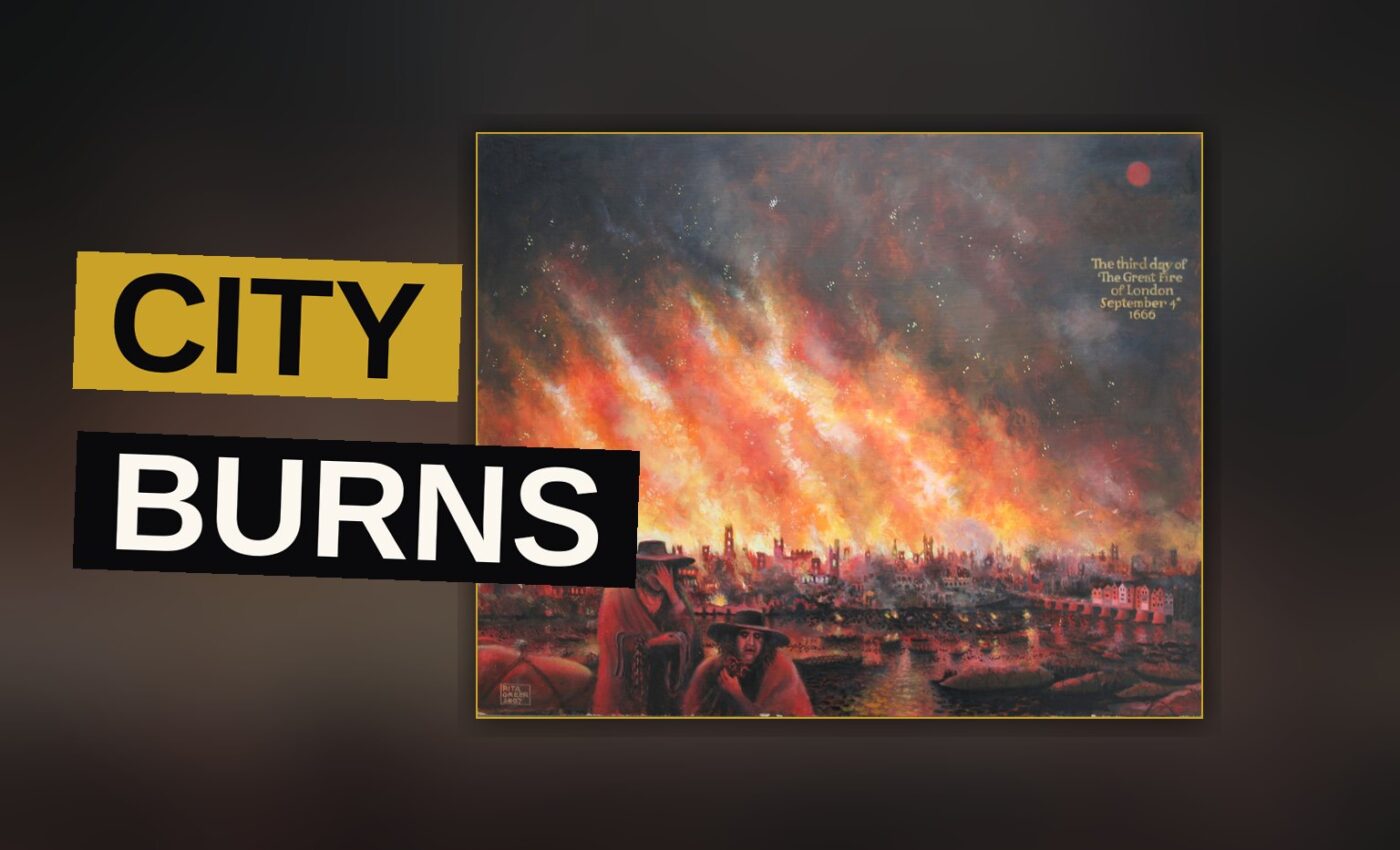 A city street blazes under a dark sky as fire spreads across its rooftops.