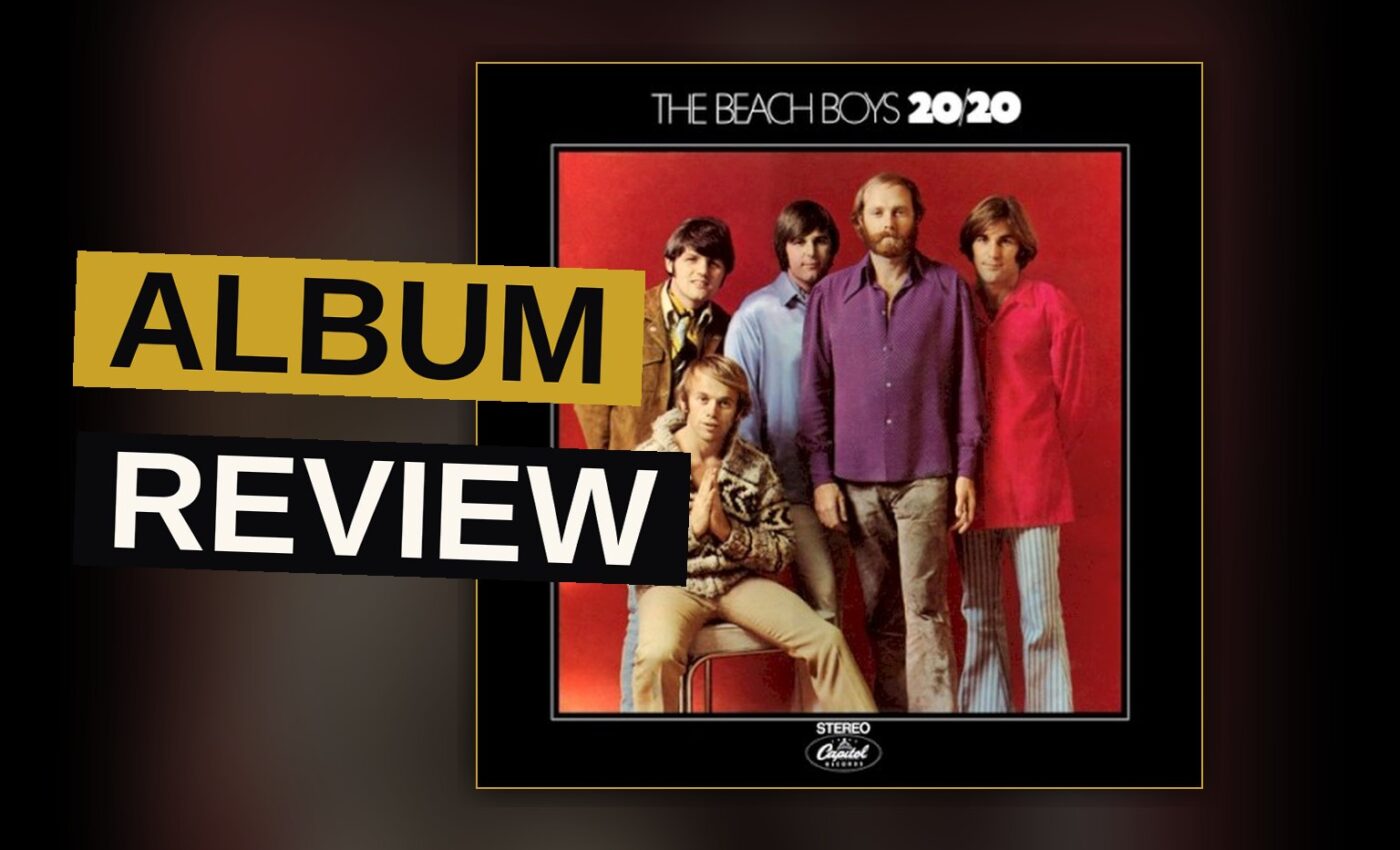 A vintage vinyl record and sun-faded album cover on a wooden table, evoking a nostalgic 1960s music mood.