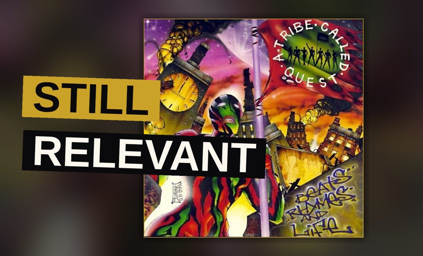 Four musicians stand together on a rooftop at dusk, representing the album's themes of unity and creativity.