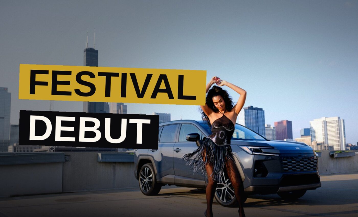 Amber Mark performs energetically on stage during her Lollapalooza debut as the crowd sings along.