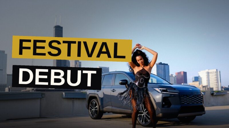 Amber Mark performs energetically on stage during her Lollapalooza debut as the crowd sings along.