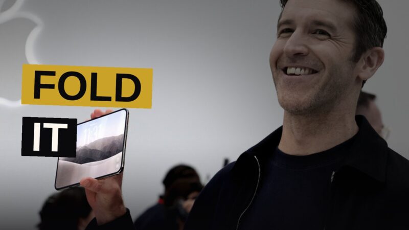 A hand holding an open foldable smartphone with a large bright display.