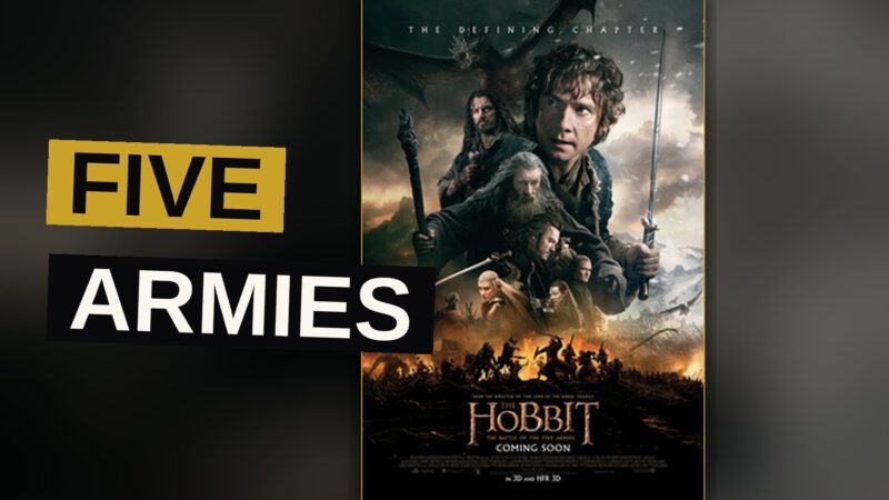 Armies of dwarves, elves, men and orcs clash upon a frozen field beneath a stormy sky.