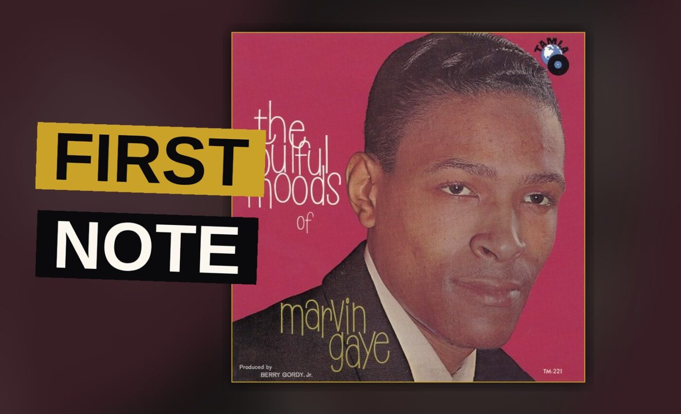 A young Marvin Gaye in a suit stands by a classic microphone in a moody studio.
