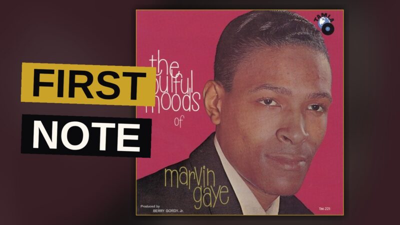 A young Marvin Gaye in a suit stands by a classic microphone in a moody studio.