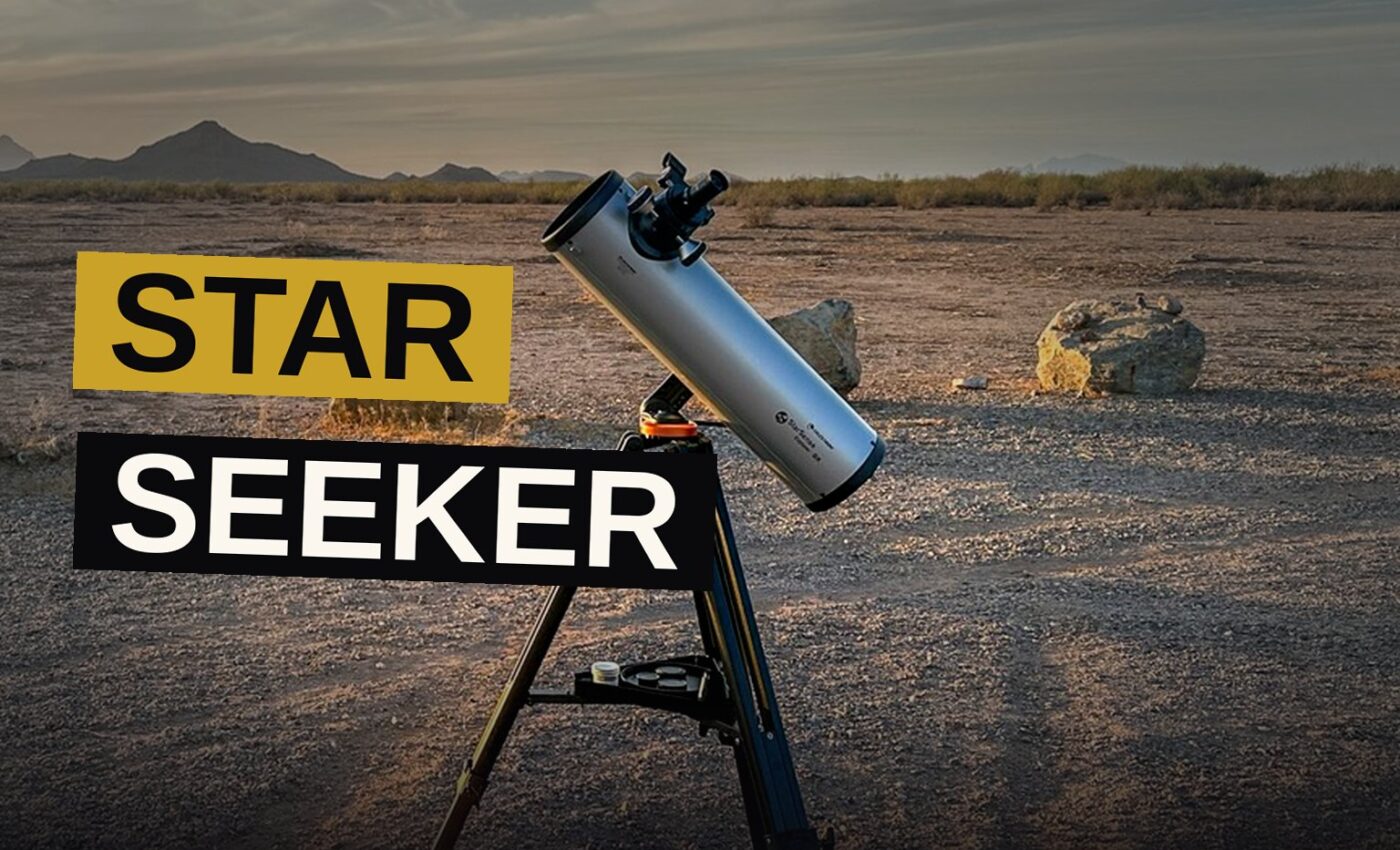 A portable telescope sits on a tripod under a starry night sky, guided by a smartphone.