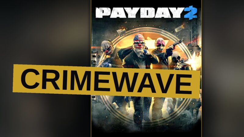Four masked robbers stand ready in a dark bank vault during a heist.