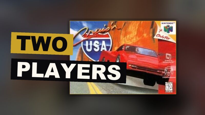 Two cars race side by side down a long American road beneath a bright, plain sky.
