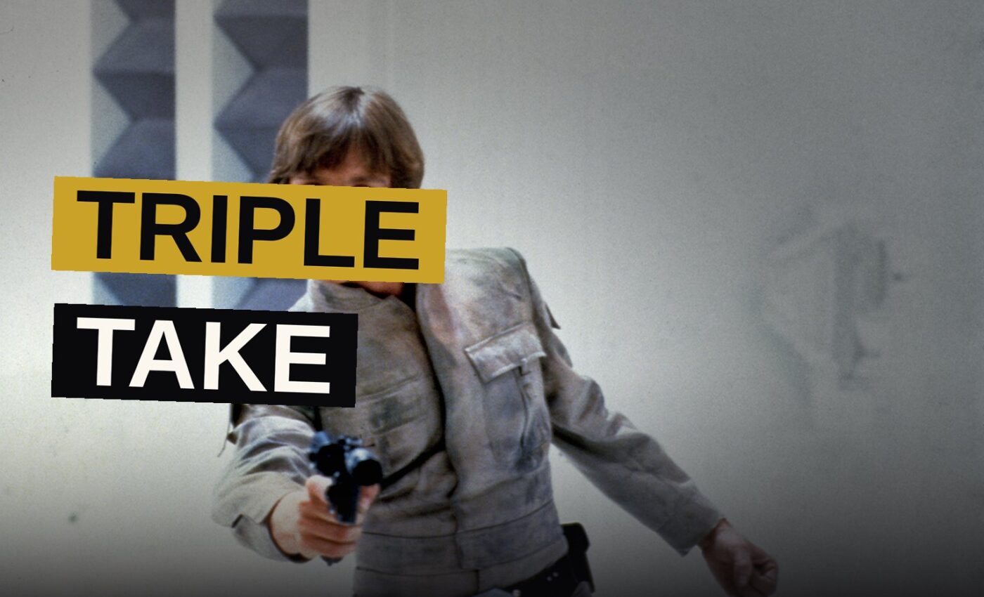 Three heroes of the Star Wars saga stand together in dramatic silhouette.