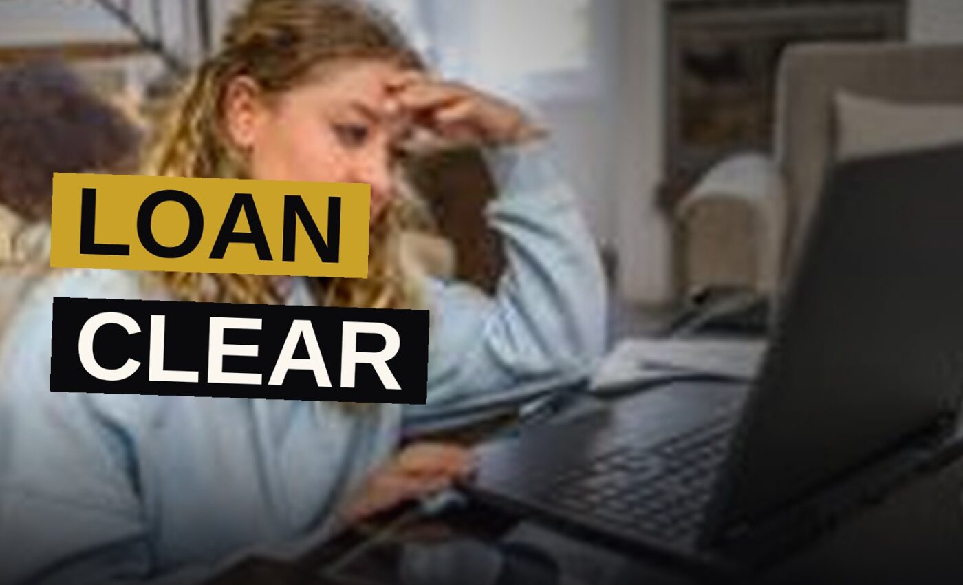 A student reviews loan documents on a desk while considering future financial obligations.