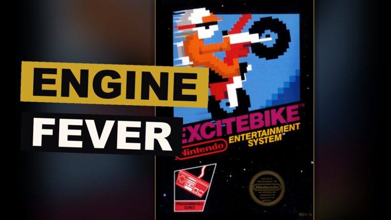 A rider upon a racing machine rises above a ramp upon a rough course, the engine's meter glowing with heat.