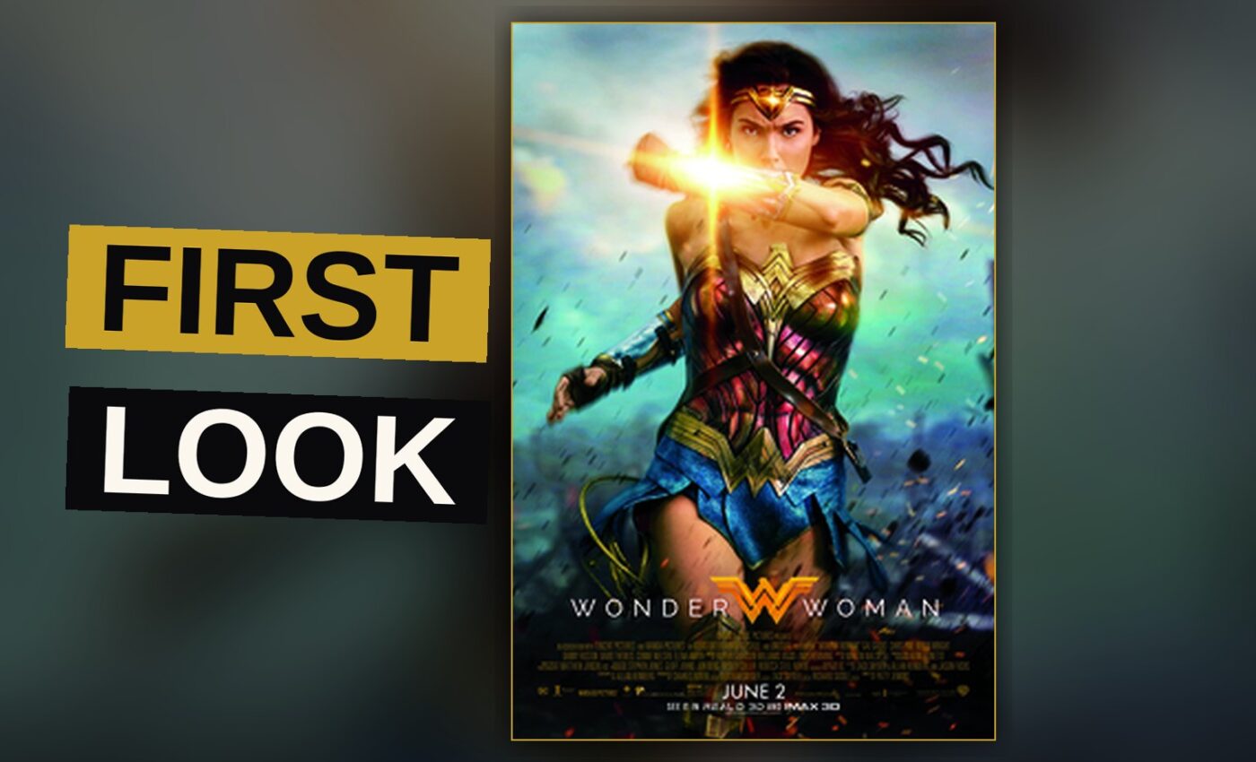 Gal Gadot as Wonder Woman in armor stands on a war-torn field at dusk, holding a shield and sword.