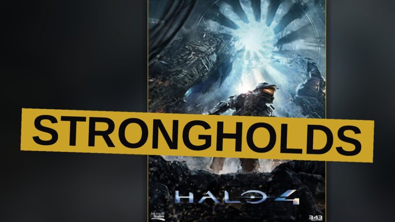 A Spartan warrior stands ready in a devastated alien battlefield.