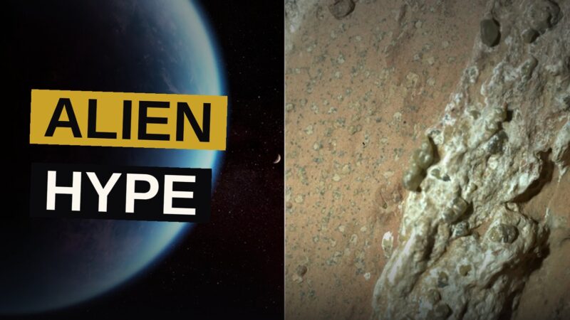A Martian rock with white mineral rings sits in reddish soil under a pale sky, with a distant exoplanet visible.