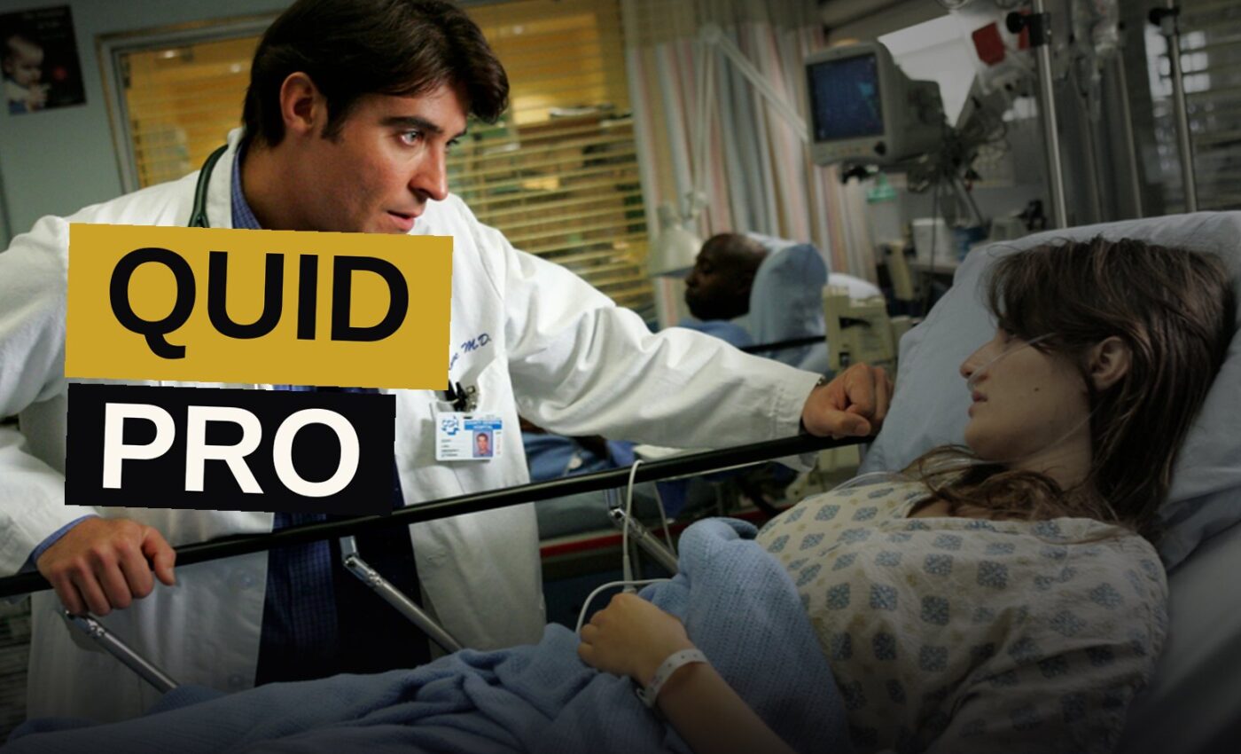 A doctor rushes through a dimly lit hospital corridor toward a patient's room.
