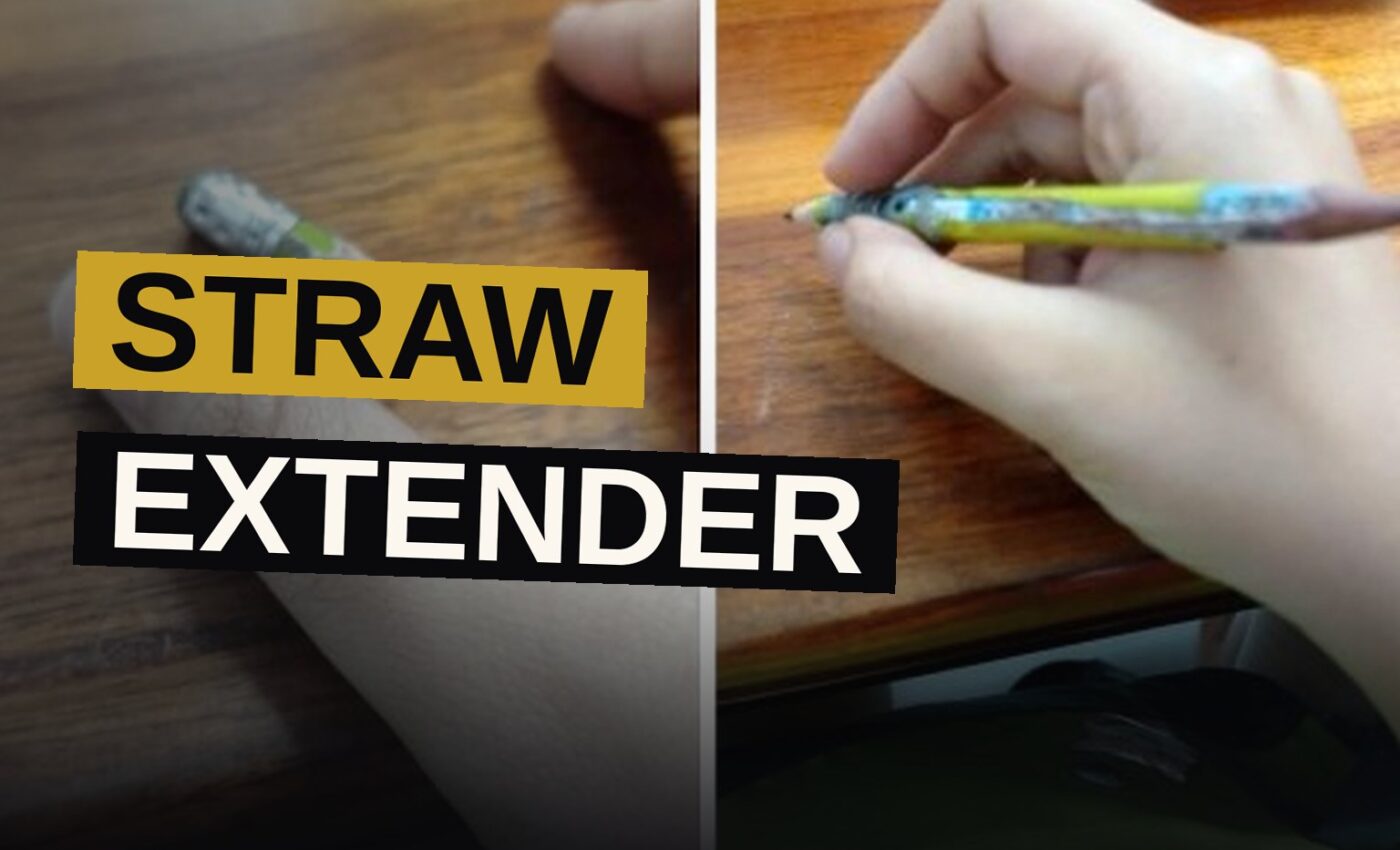 A tiny pencil is inserted into a straw, taped together on a desk beside a notebook.