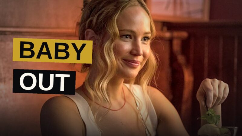 Jennifer Lawrence stands with her phone raised, looking at her new Instagram profile.