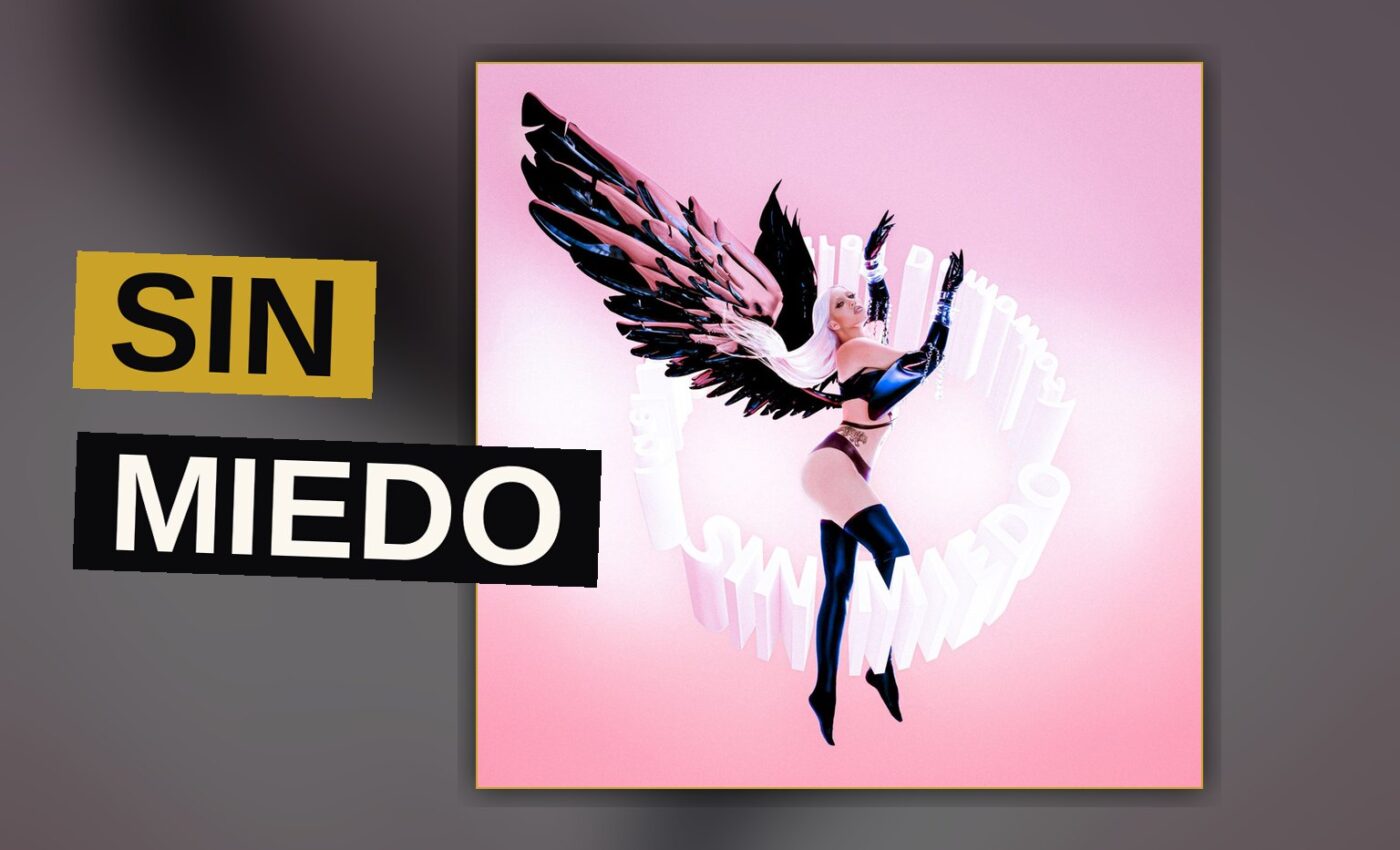 A stylized image of a singer surrounded by neon lights and a glowing moon, evoking a dreamy Latin pop album mood.