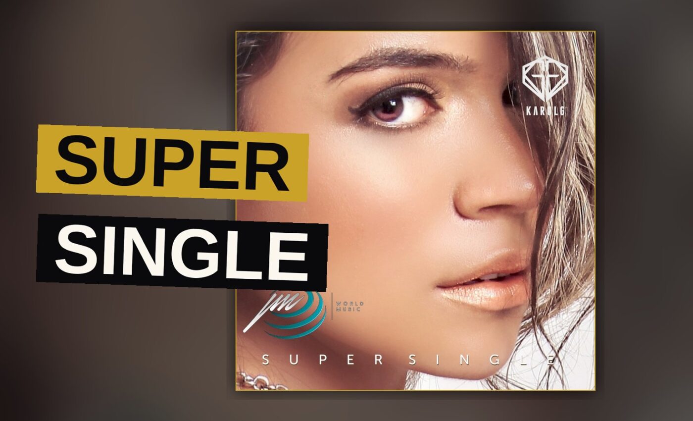 A pop star performs energetically under bright stage lights.