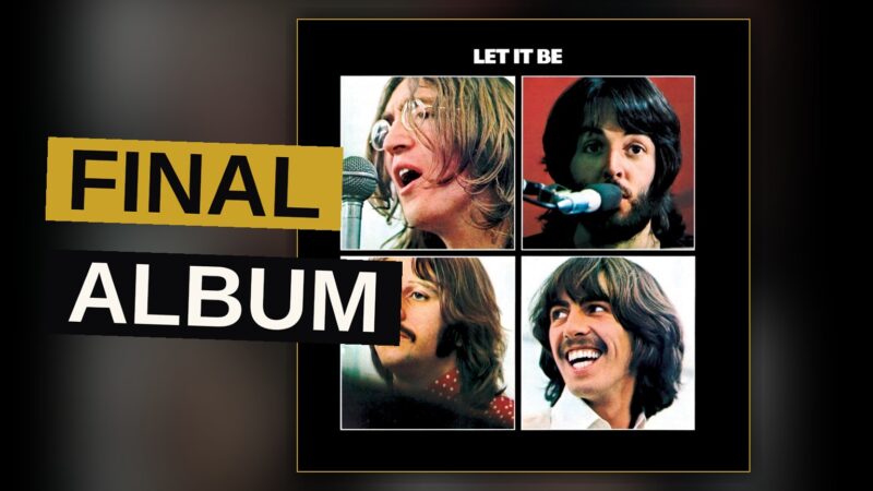 A worn vinyl record sleeve for 'Let It Be' rests on a wooden table, bathed in soft window light, with a faded black-and-white image of four men on the cover.