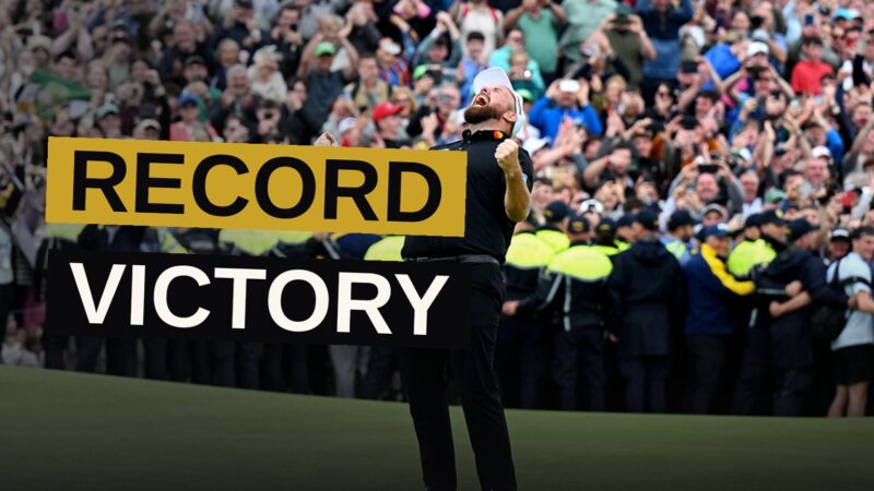 Shane Lowry stretches his arms wide on the 18th green after winning the Irish Open with an 11-shot margin.