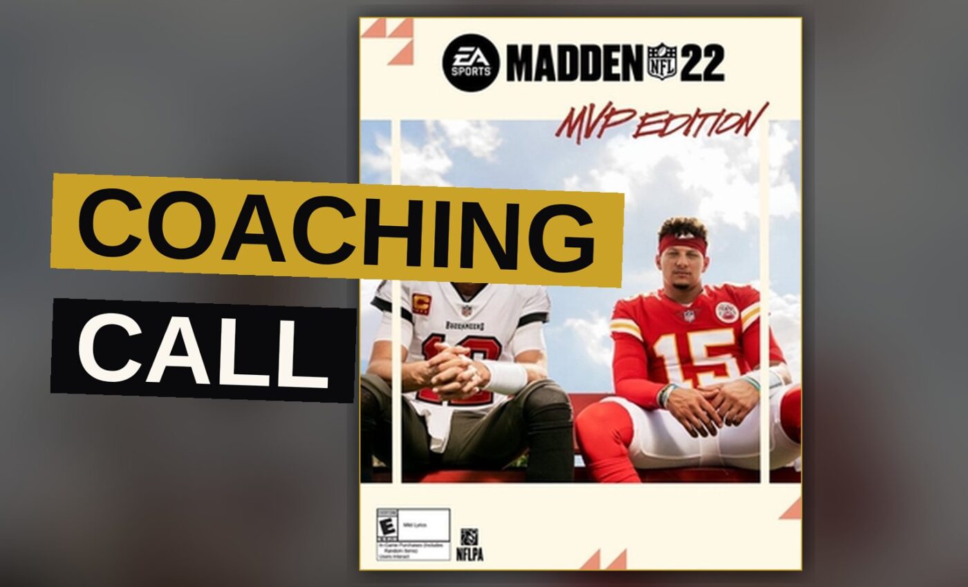 A football player evades a defender as a coach signals a play from the sideline.