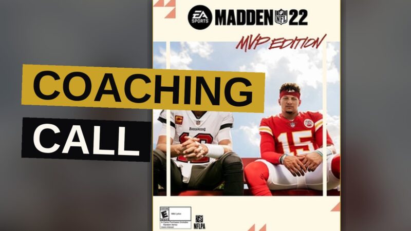 A football player evades a defender as a coach signals a play from the sideline.
