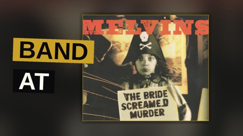 A guitarist buried in distortion and smoke, evoking the dense, heavy sound of the album.