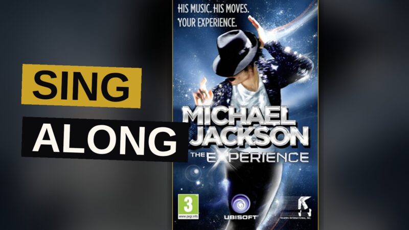 A dancer moves before a glowing screen showing a phantom singer, caught amid a storm of light.