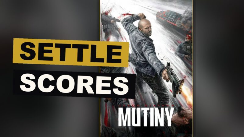 A man wages a solitary war upon a cargo ship, fists raised, seeking to settle a bitter score.
