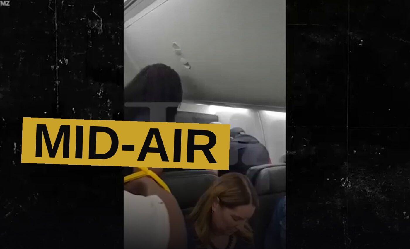 Two men hold down a raving passenger in his seat while others look on in dread within the narrow cabin.