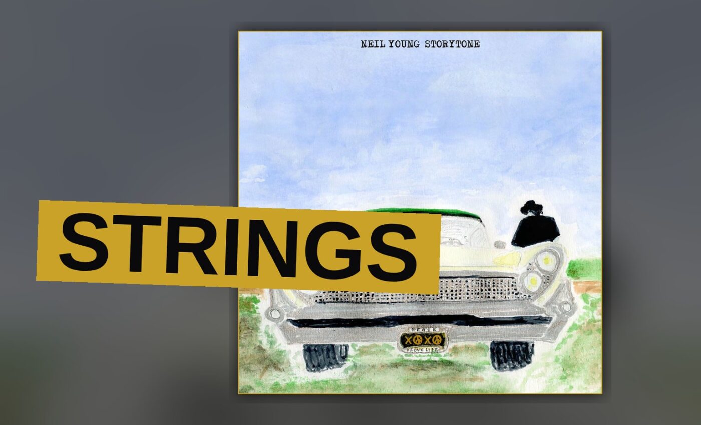 A lone singer stands before a grand orchestra, strings swelling around a worn and mournful voice.
