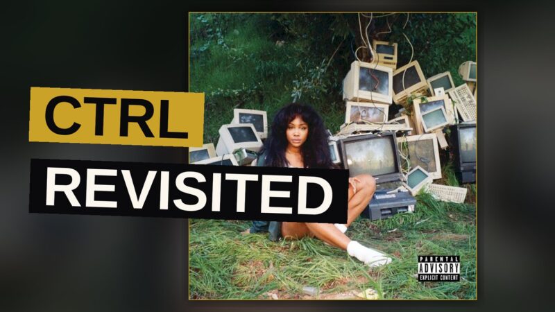 A young woman sits thoughtfully bathed in warm golden light, evoking the intimate mood of an R&B album.