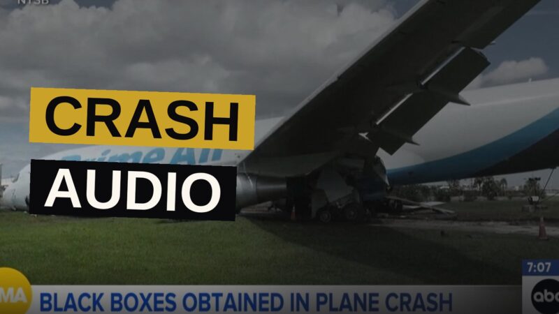Emergency vehicles surround the wreckage of a cargo plane on a Miami runway at dusk.