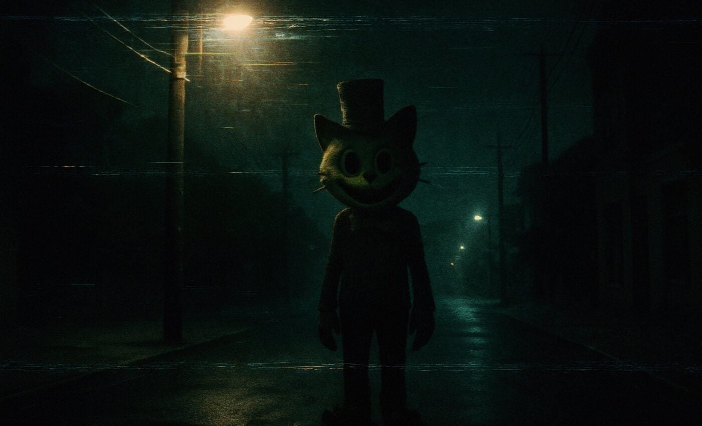 A strange figure in a hat, resembling a cat, does not truly appear upon the darkened street, being but a shadow wrought by artifice.