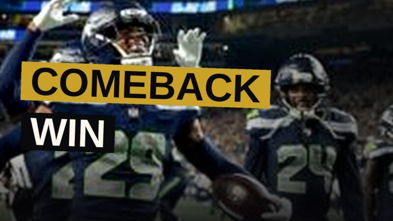 Seattle Seahawks players celebrate their comeback victory on the field at Lumen Field.