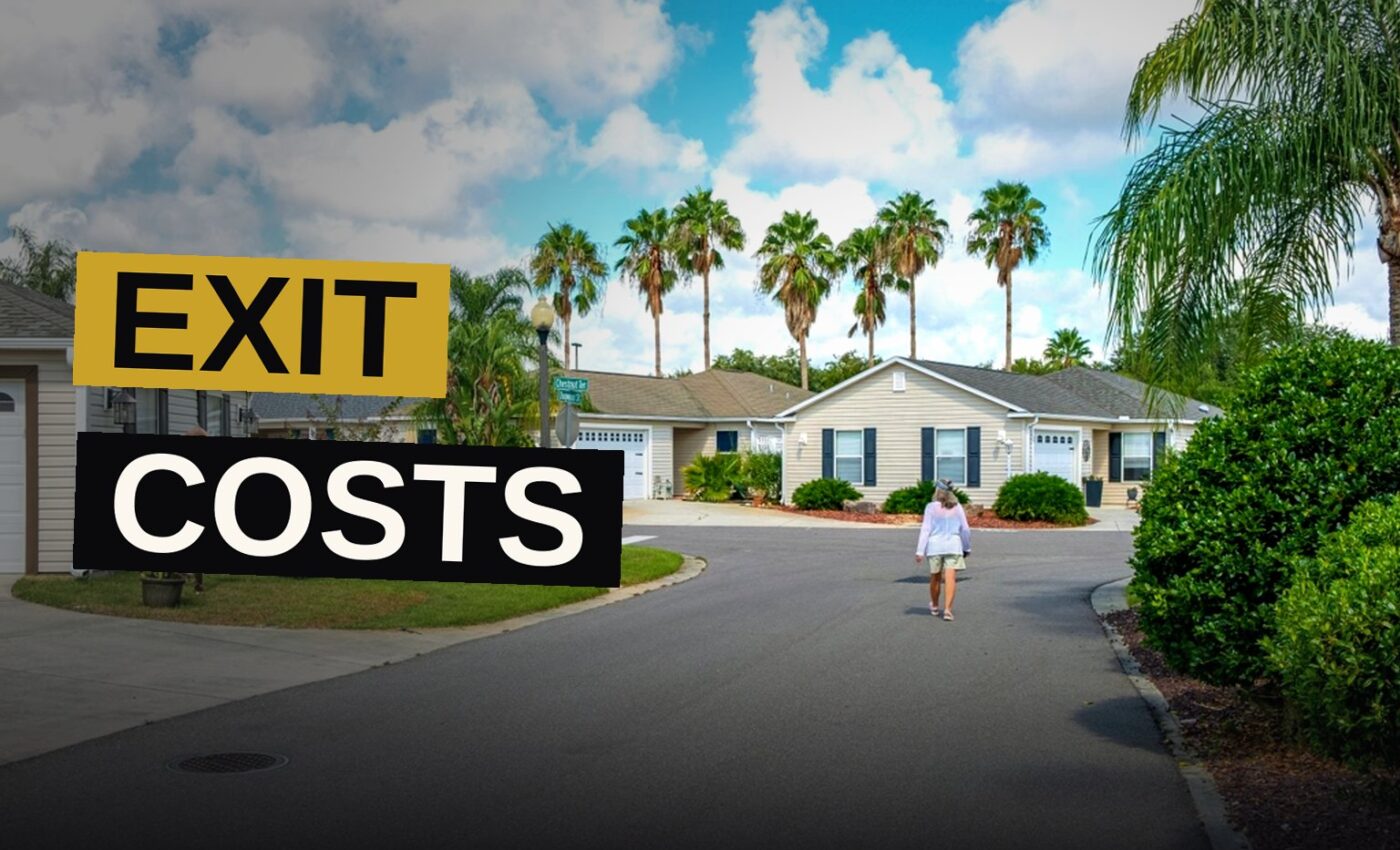 A Florida retirement community with a for-sale sign in front of a villa, golf carts nearby.