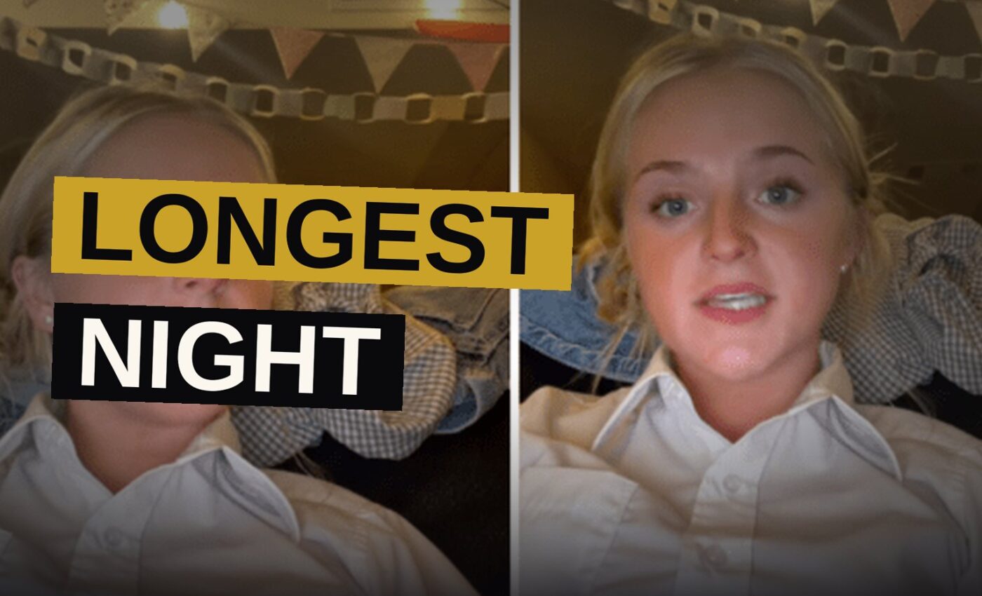 A server stands frozen at a table of 14 guests who cannot hear her, in a dimly lit restaurant.