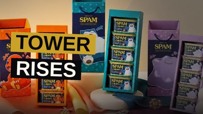 Three towers of SPAM, each adorned with a Pokemon visage, stand upon a counter amid a throng of eager buyers.