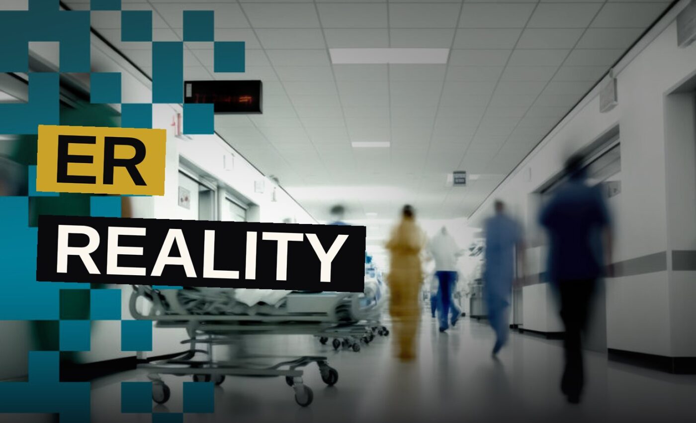 Doctors and nurses move quickly through a crowded, dimly lit emergency room.
