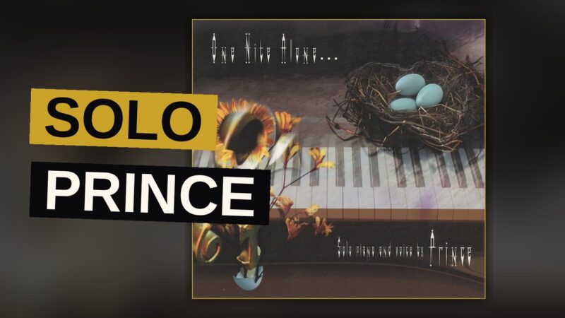 A dimly lit piano with a lone silhouette seated at the keys, evoking a private late-night performance.