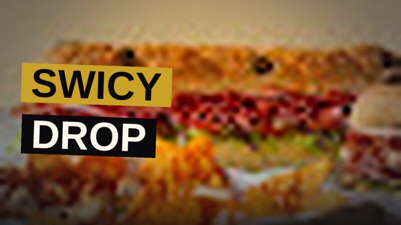 Overhead view of Subway's Doritos Hot Honey Nachos with chicken and cheese, next to a Propel Kiwi Strawberry bottle.