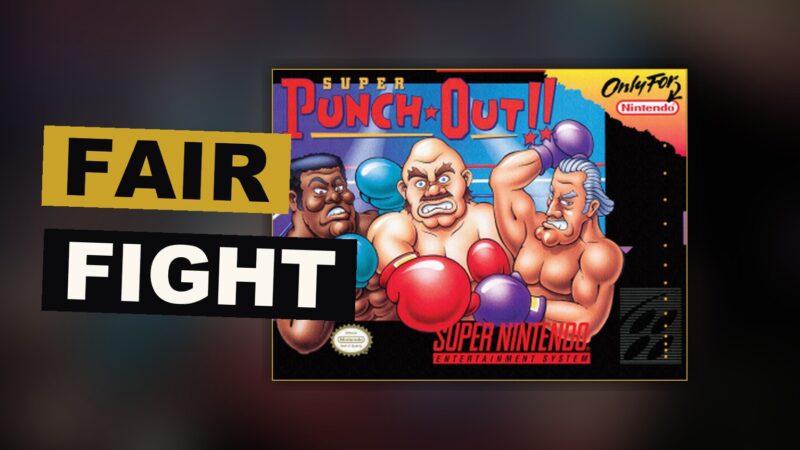 A boxer readies his guard as his rival winds up a blow, watched by those seated behind them.