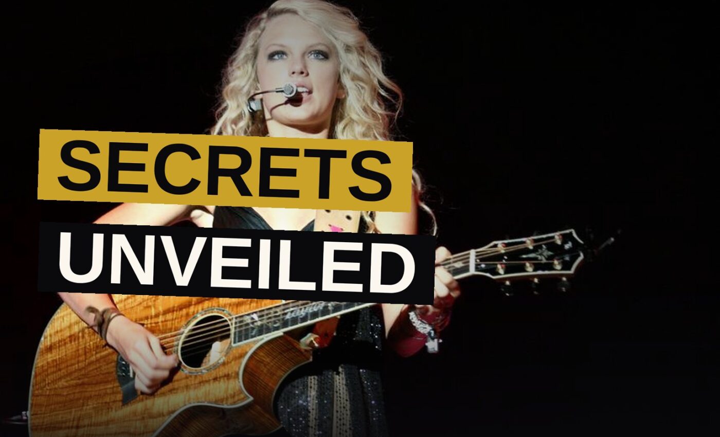 A singer sits alone with a guitar in a dimly lit studio, evoking intimacy and nostalgia.