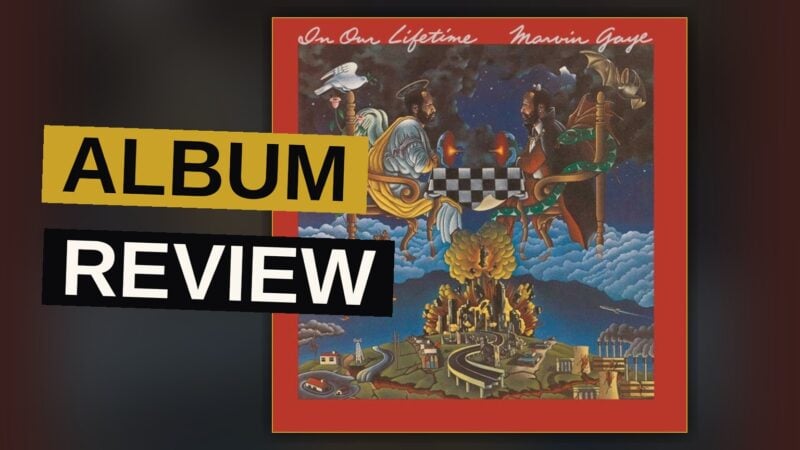 A vintage vinyl record sleeve for Marvin Gaye's 'In Our Lifetime' lies on a table, with the record partially pulled out under moody lighting.