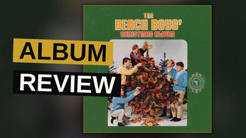 A retro illustration of Santa and the Beach Boys on a sunny California beach with a sleigh and surfboard.