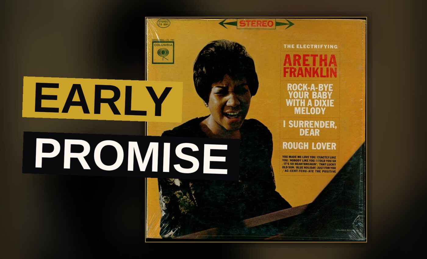 A young Aretha Franklin performs on stage under dramatic spotlight.