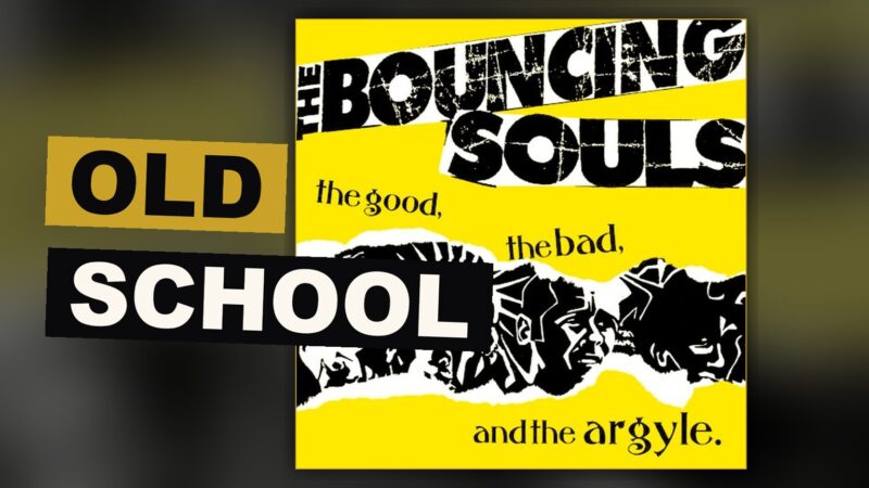 A punk band plays with wild soul before a bouncing gathering in a dim, close room.