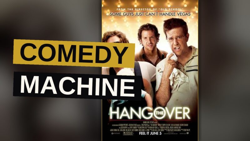 Four disheveled men in suits stand in a trashed hotel room, with a tiger in the bathroom and a baby in the closet.