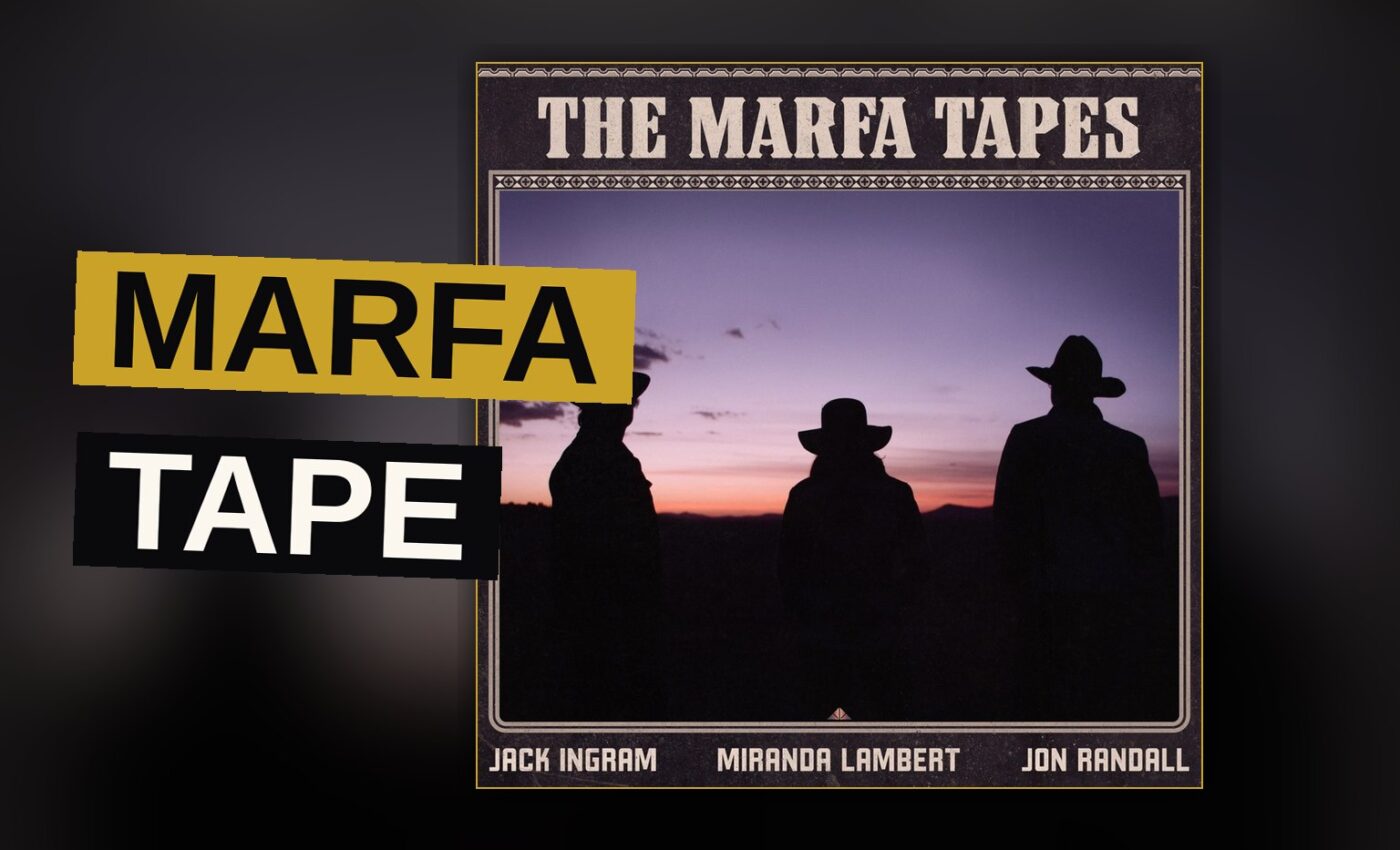 Three musicians sit beneath a desert sky, their instruments resting beside them as the sun sets.